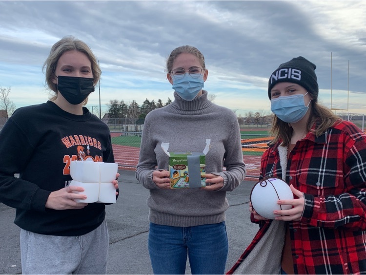 students with egg for egg drop