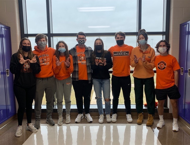 students wearing orange 
