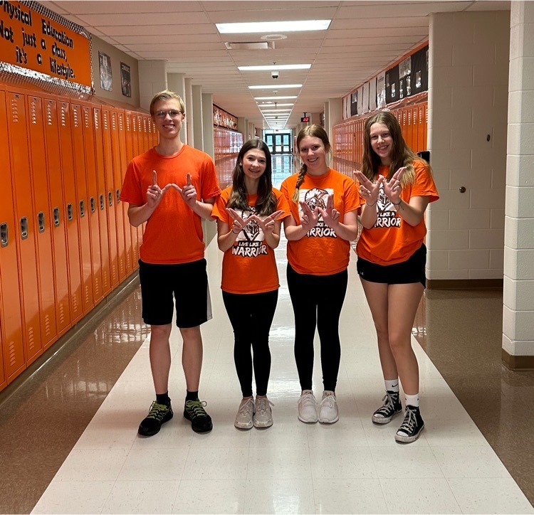 students wearing orange 